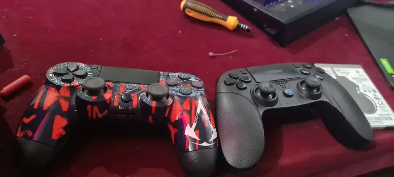 Rs 5,500 2 ps4 controller 1 is gomary edition other is assasins creed ed Zakariya Town, Multan